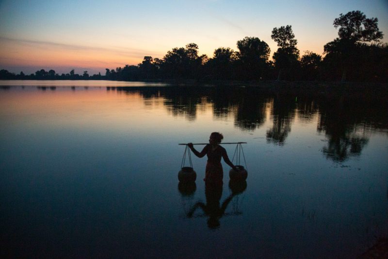 Collecting Water At Sunset (Print 79)