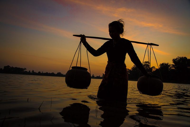 Collecting Water At Sunset (Print 80)